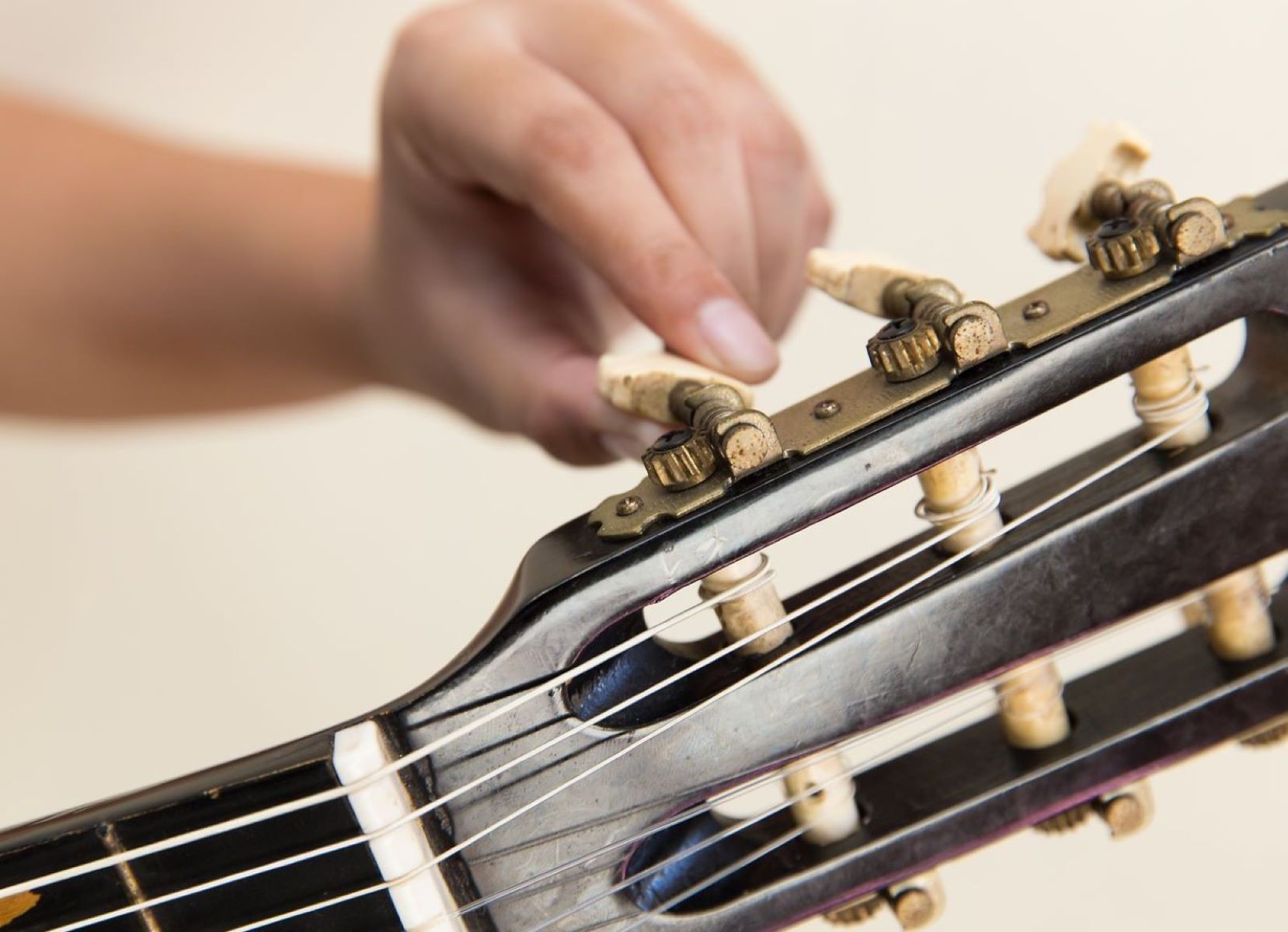 How To Restring A Folk Guitar