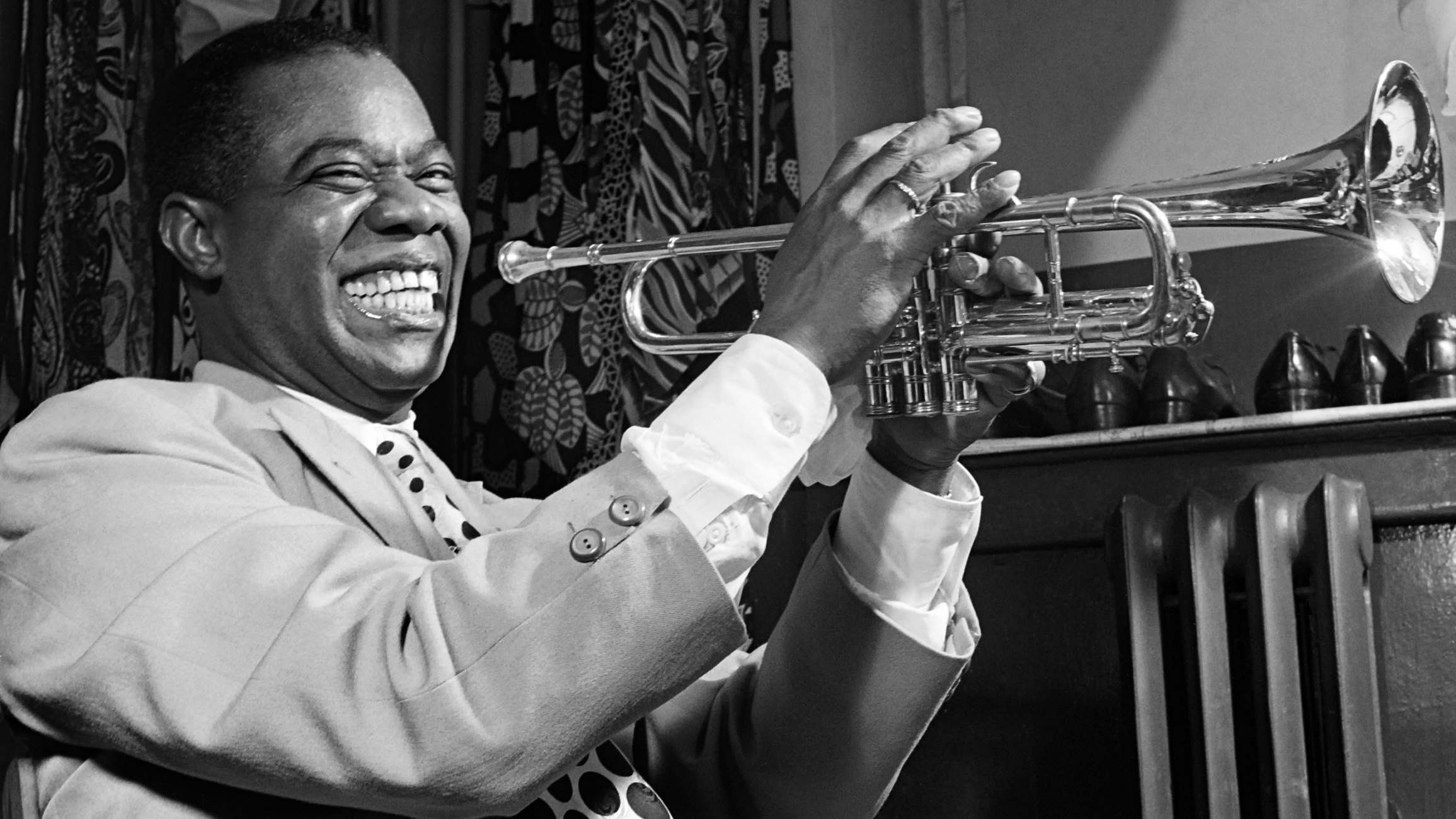 What Did Louis Armstrong Contribute To Jazz