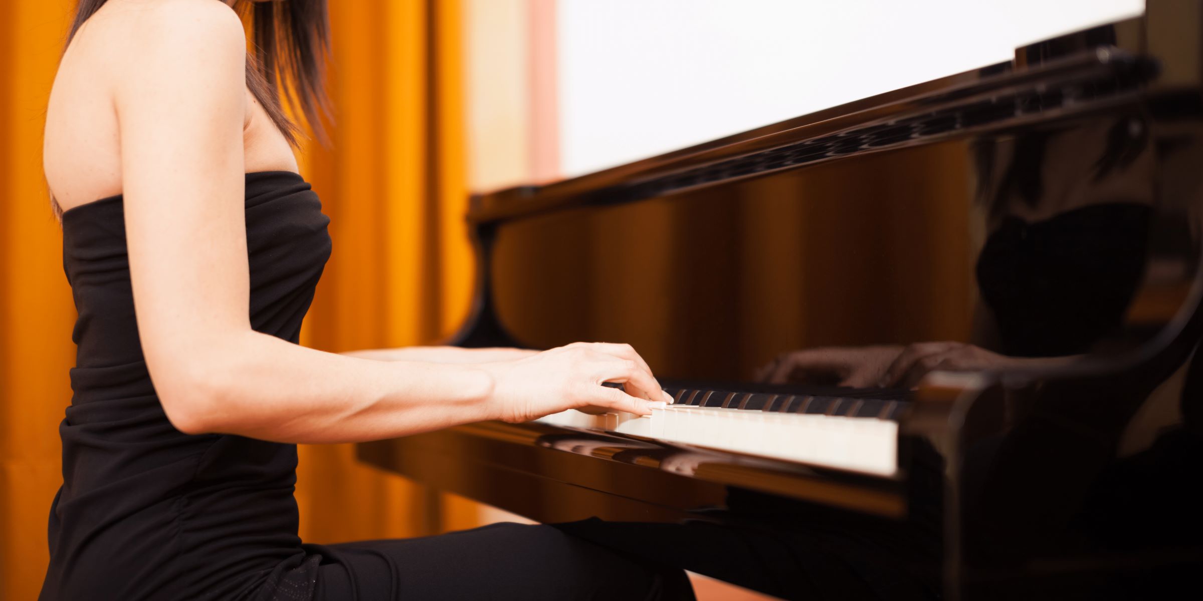 Which Famous Musician Sings And Plays Piano?