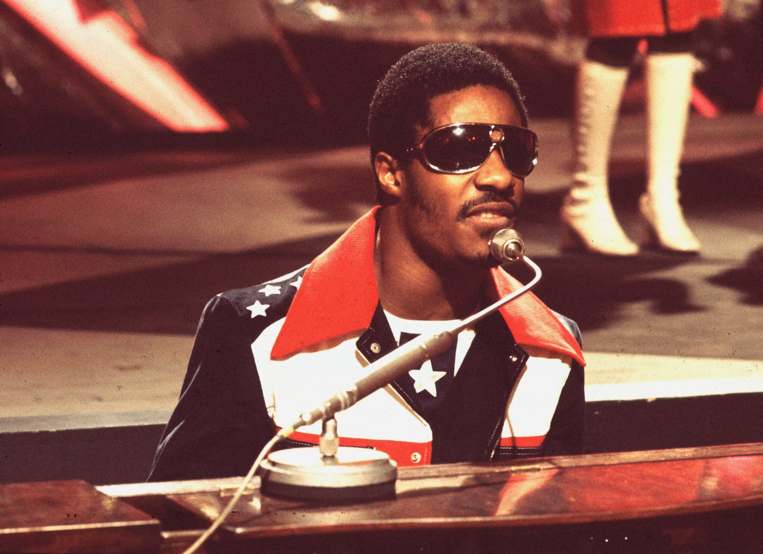 At What Age Did Singer-Songwriter Stevie Wonder Sign With Motown Records?