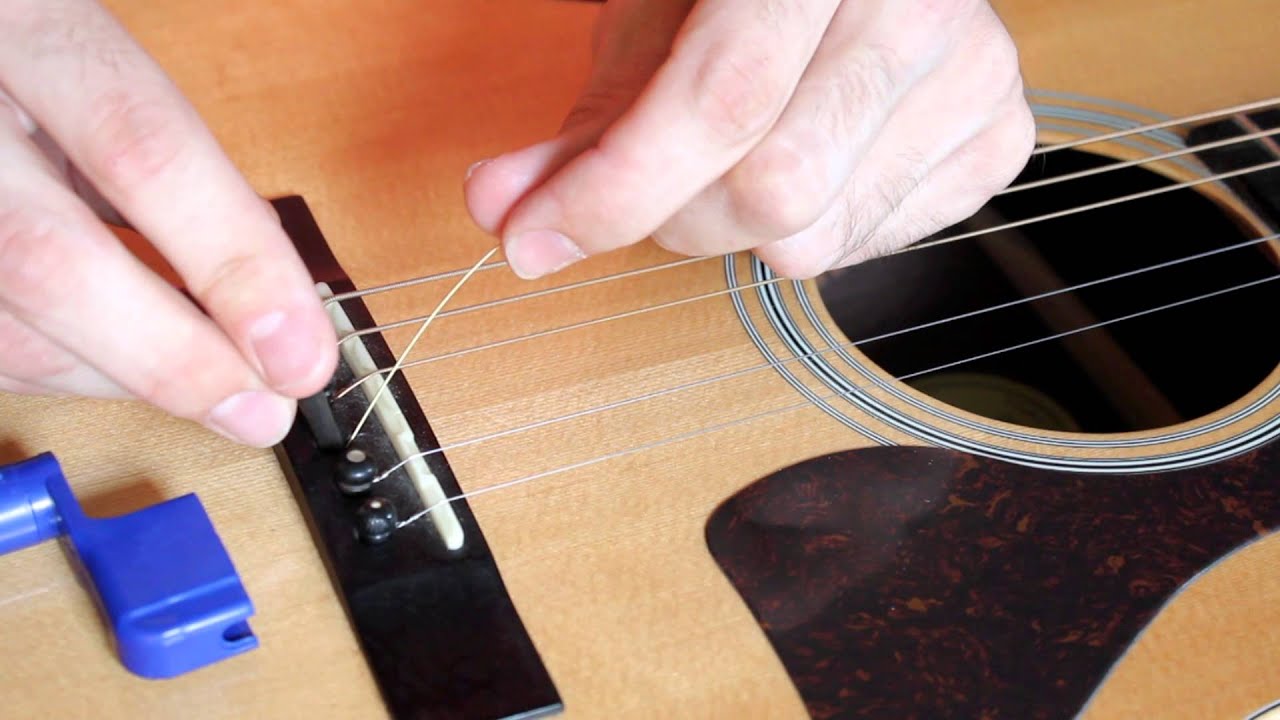 How To Change The Strings On An Acoustic Guitar