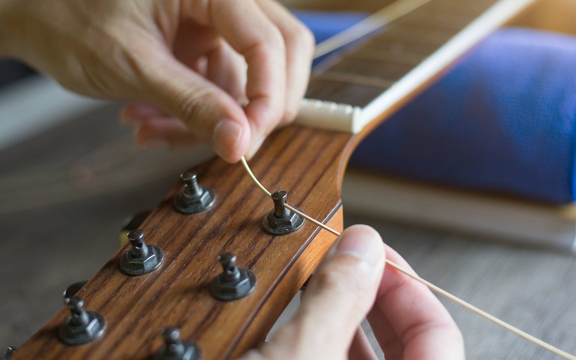 How To Replace Strings On An Acoustic Guitar